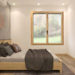 fenêtre multi matériaux Alya Nature dans une chambre dans les tons chaleureux